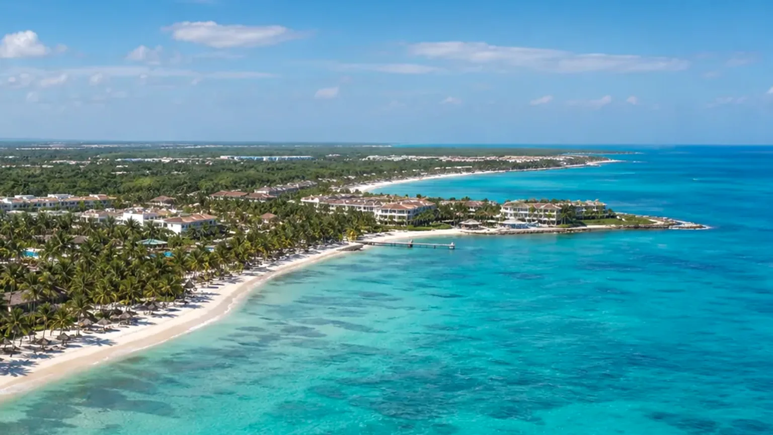 Zona de Cap Cana em Punta Cana, com costa organizada, resorts premium e acesso a partir do aeroporto PUJ.