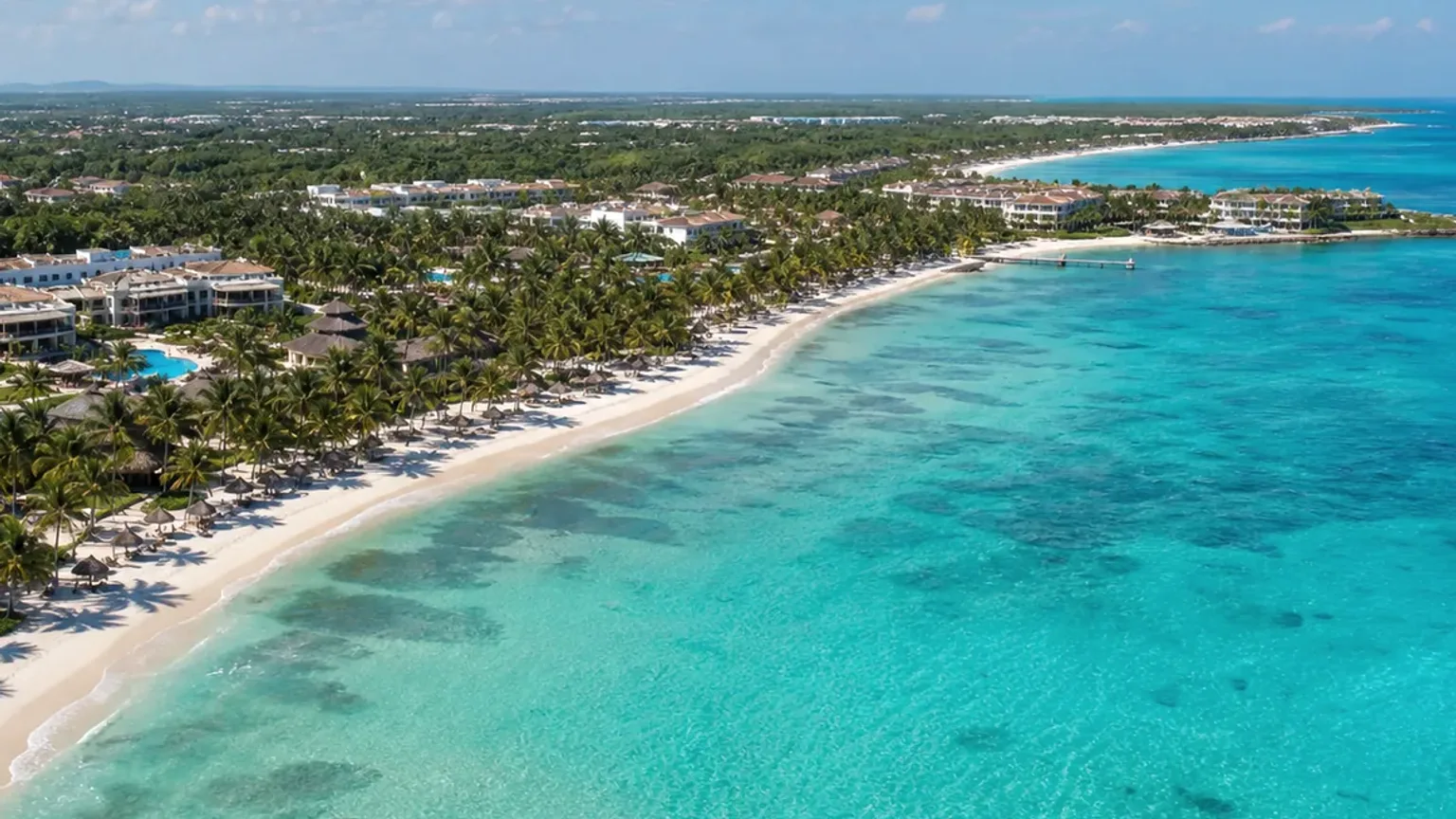 Vista fotográfica de costa e resorts em Punta Cana para comparar zonas e tipos de estadia.